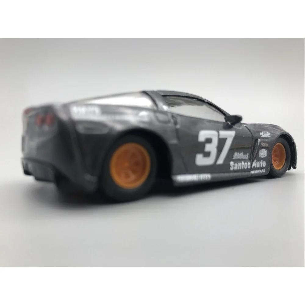 Jada 2006 06 Chevrolet Chevy Corvette Z06 Race Car Gray Diecast 1/64 Rubber Tire